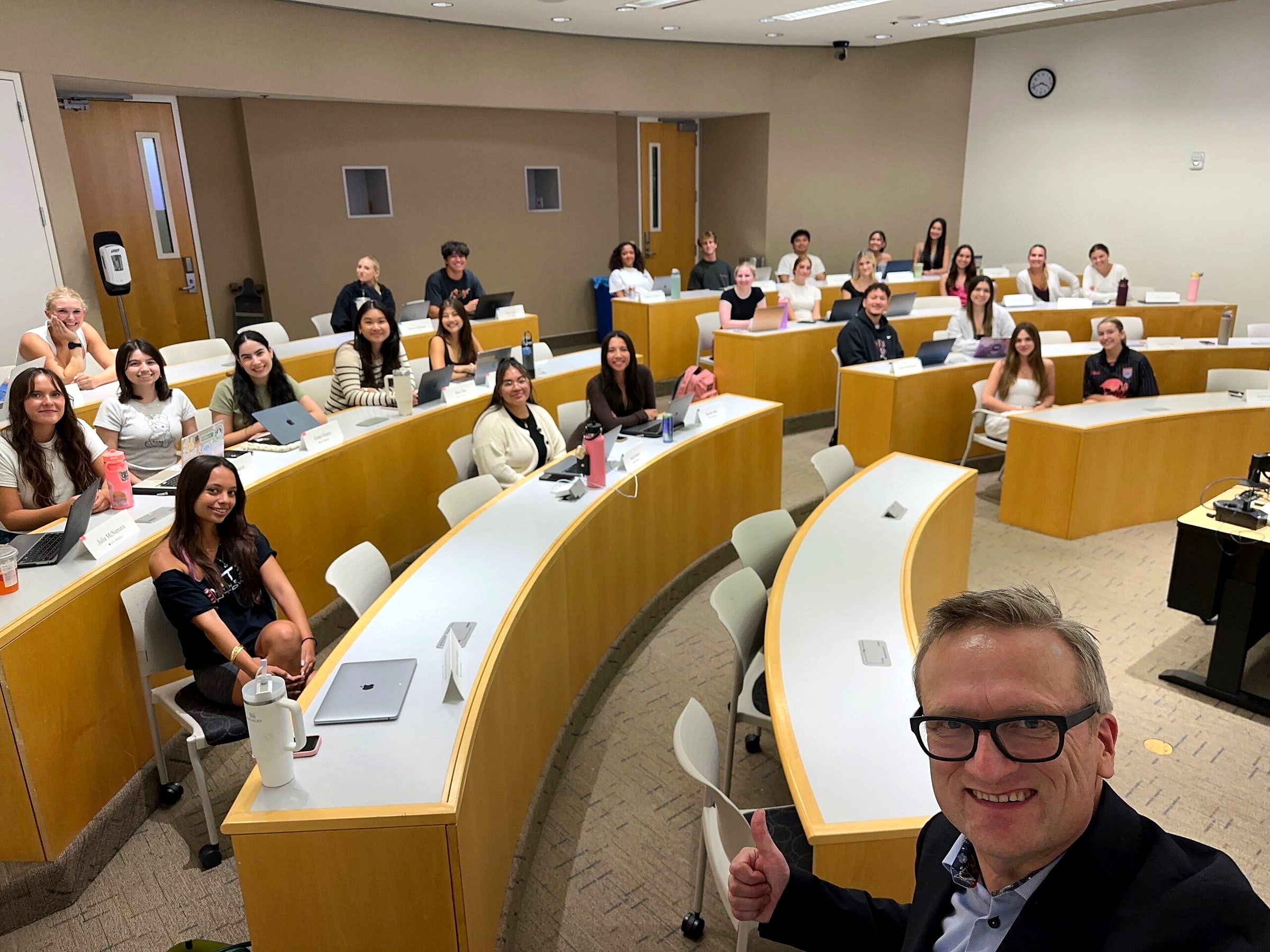 Fall 2025 Influencer & Social Media Marketing class selfie in a tiered room