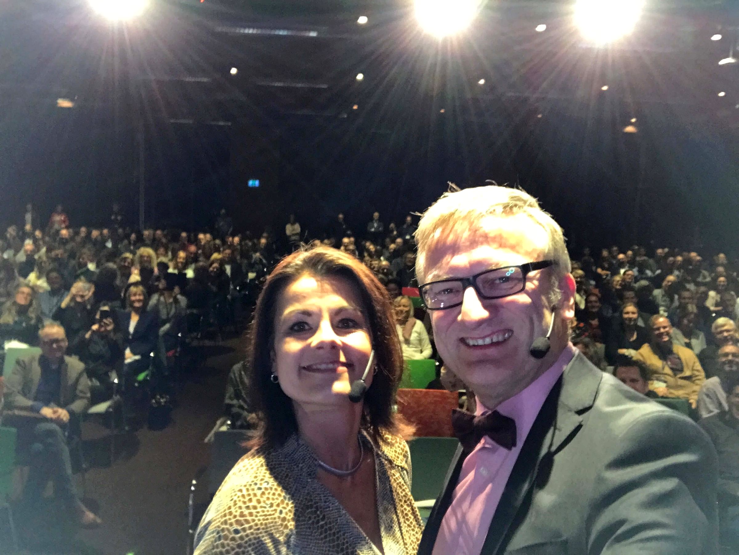 Stage selfie with master of ceremony Anna Bellman and a full hall