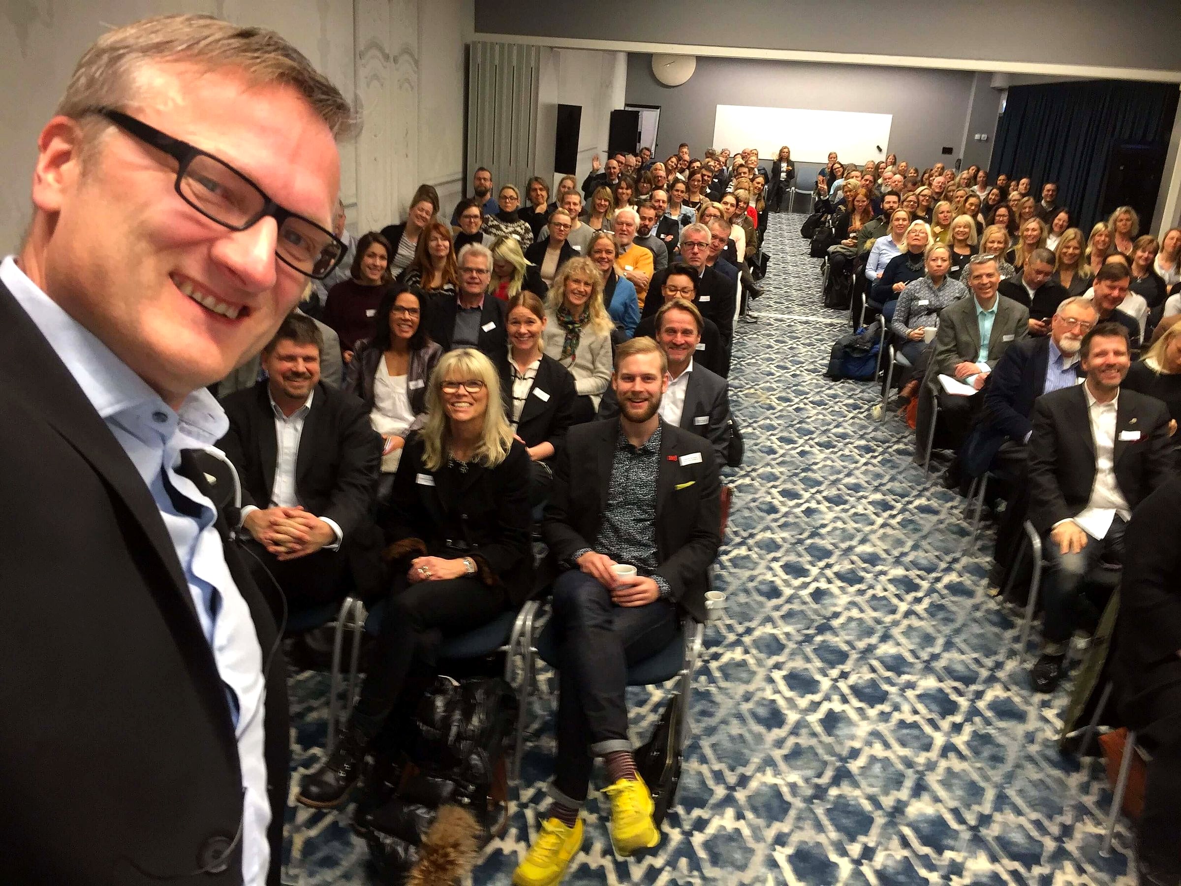 Selfie from the stage with a full audience behind Niklas