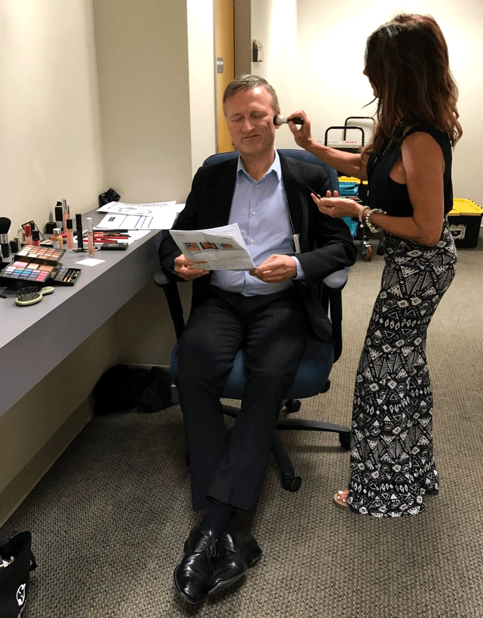 Niklas in a chair getting make-up before his TEDx talk